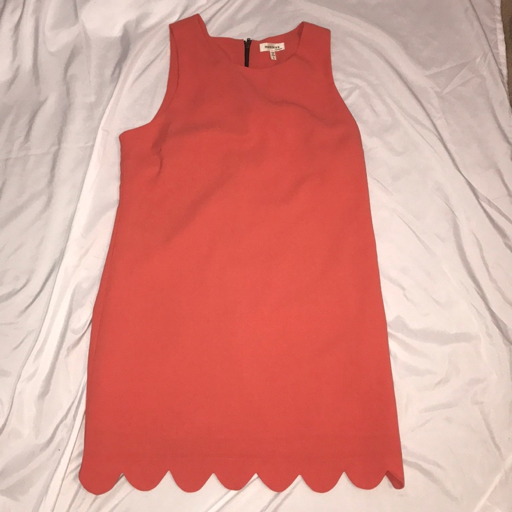 Scalloped hem dress.